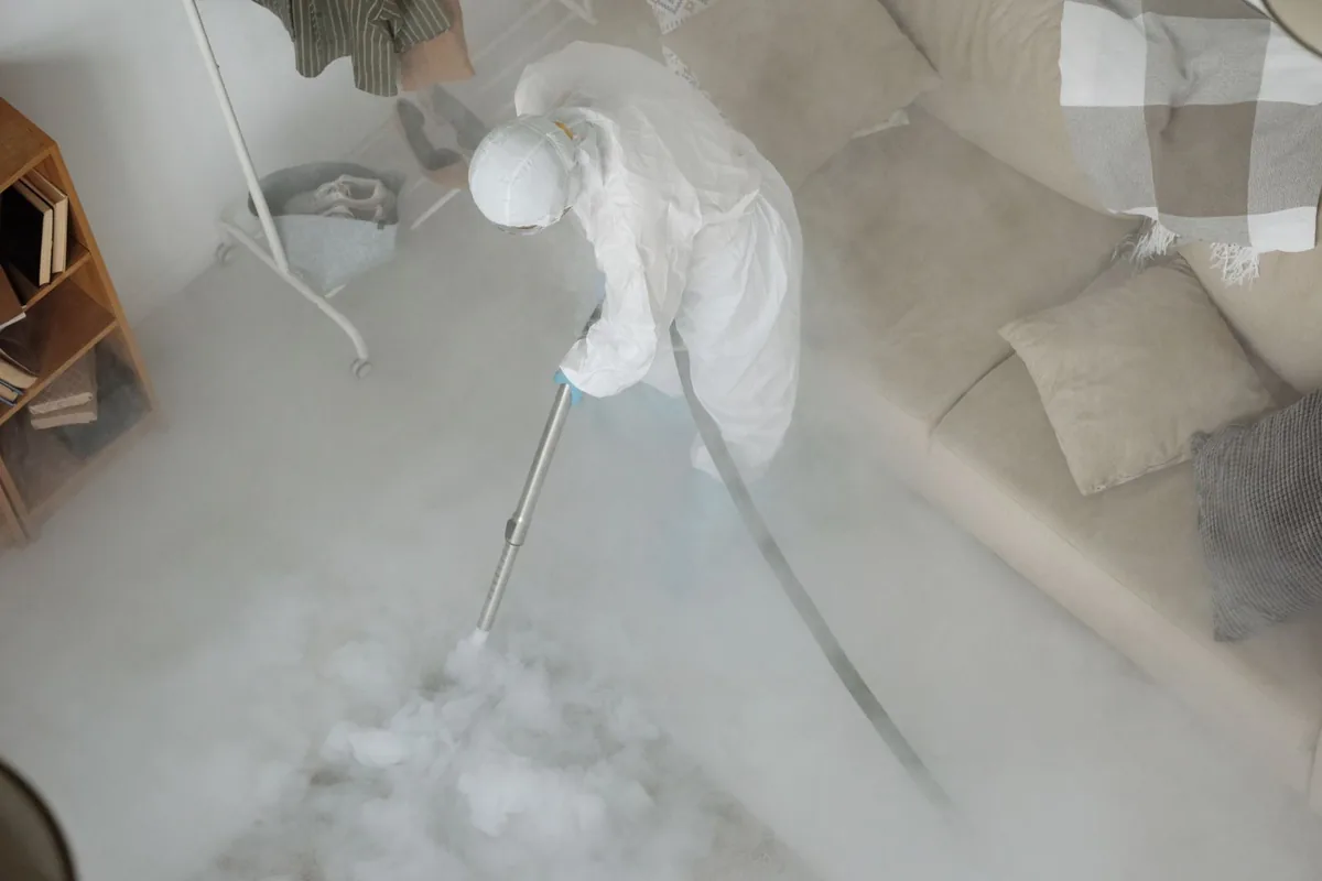 Biohazard cleanup technician in protective equipment, Lighthouse Point, FL
